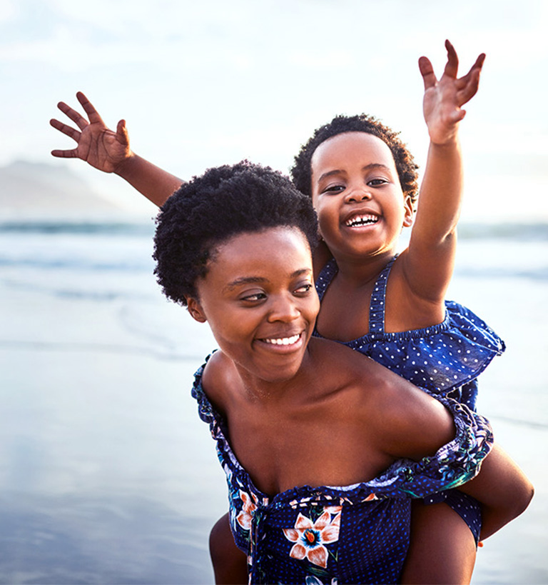 woman and child on beach