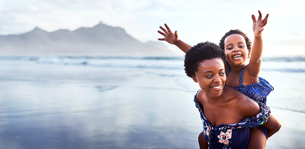 woman and child on beach