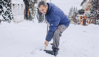 man shoveling