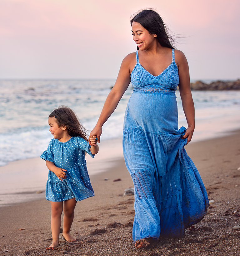 woman and child on beach