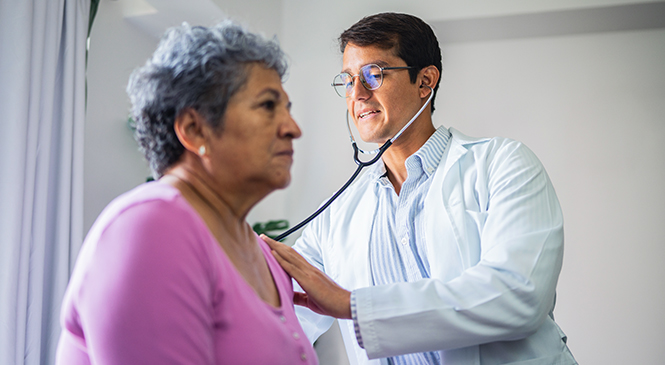 Doctor treating patient for respiratory illness