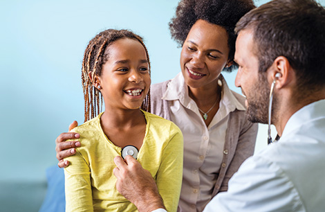 girl and mother with doctor