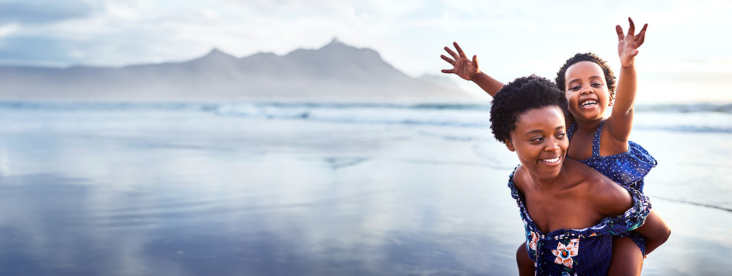 woman and child on beach